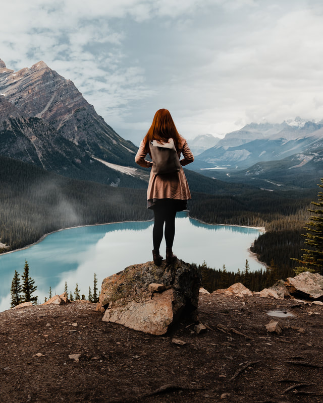 Girl looking out over Peyto Lake